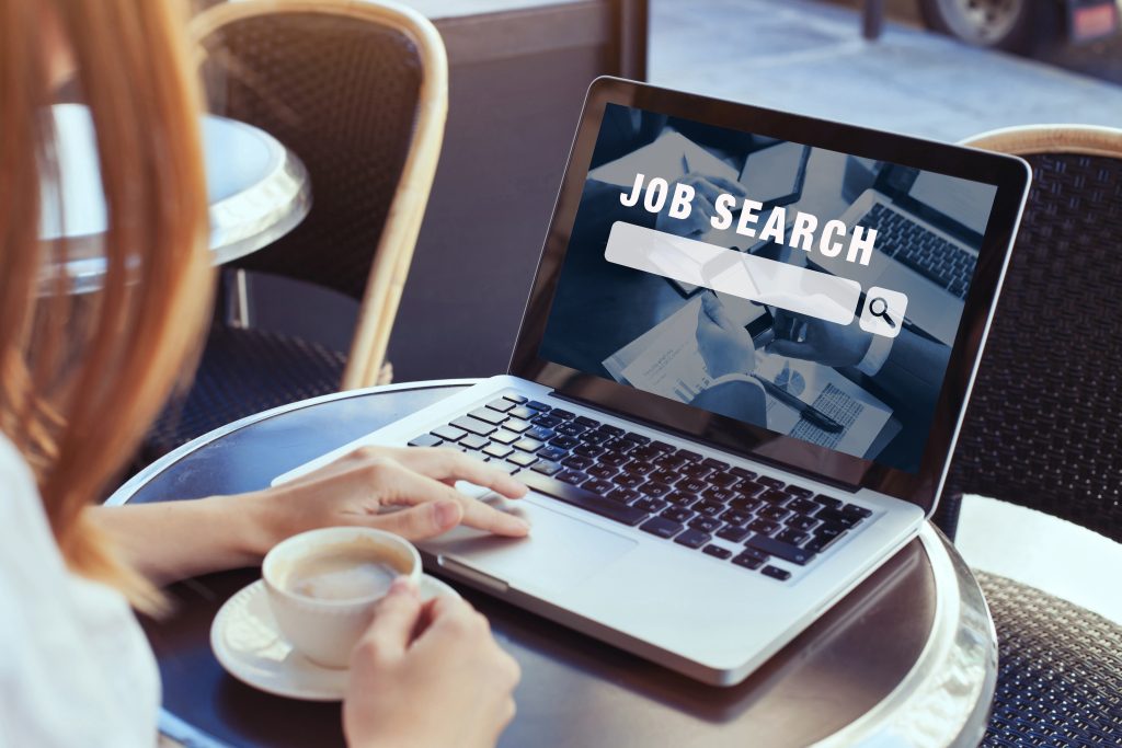 Woman looking at job search website on computer