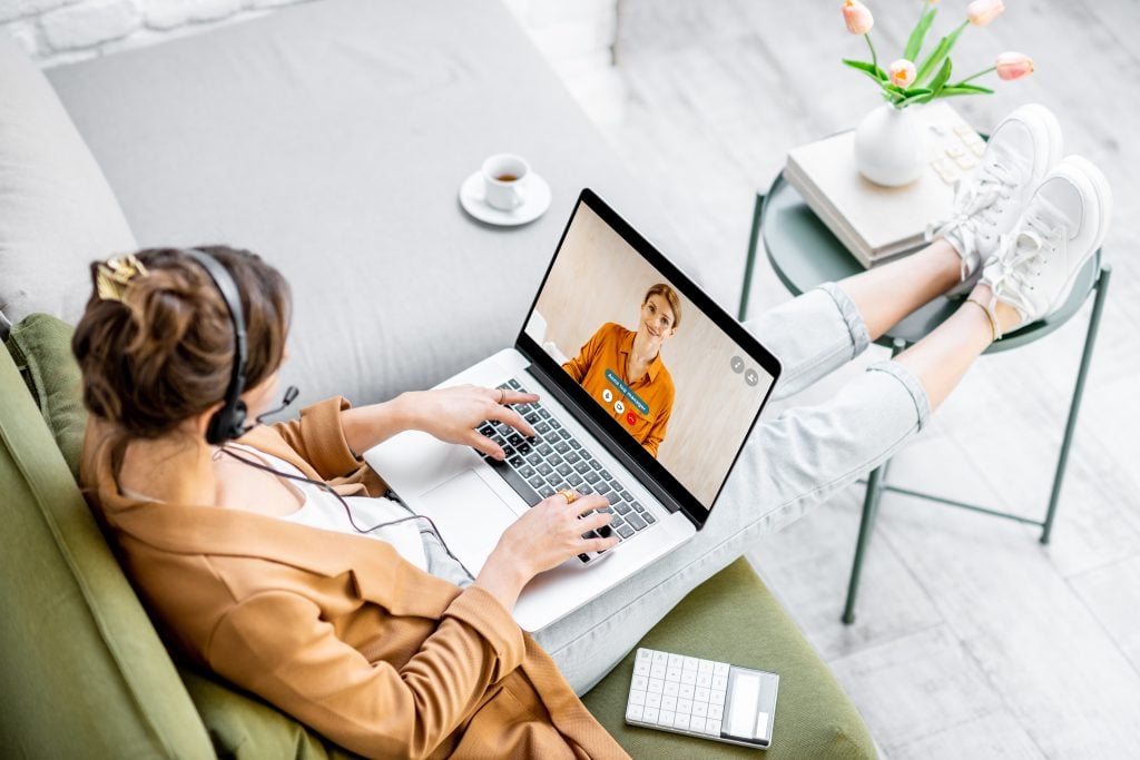 Business woman having a video call with coworker