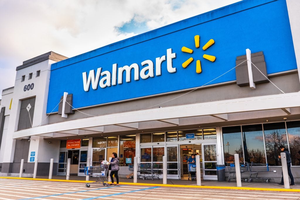 People shopping at a Walmart store.