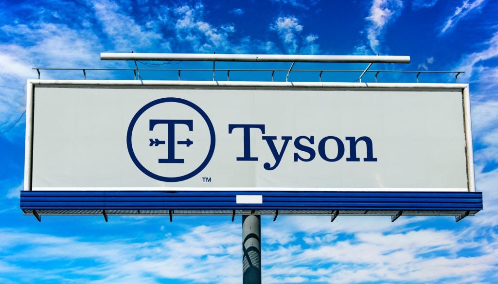 Advertisement billboard displaying logo of Tyson Foods, a multinational corporation, based in Springdale, Arkansas, USA that operates in the food industry